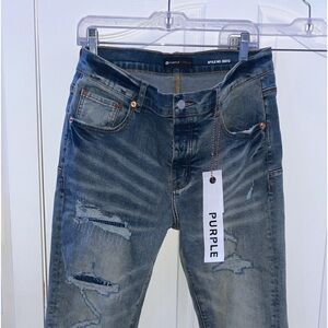 grey-blue, slim purple jeans, all tags on